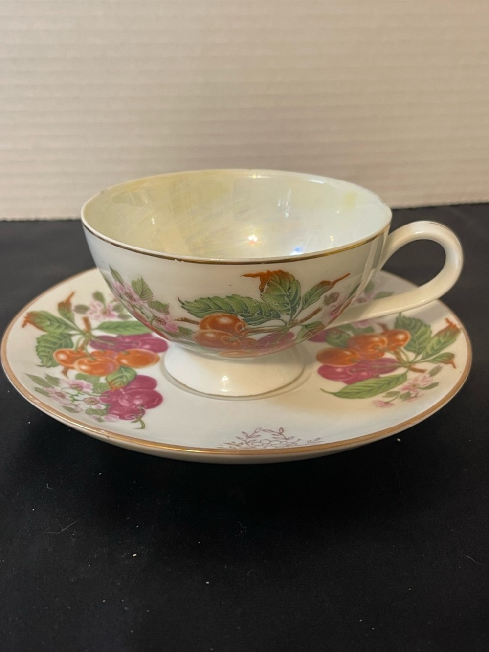 Porcelain Cup & Saucer with Green Leaves and Orange-Pink Fruit